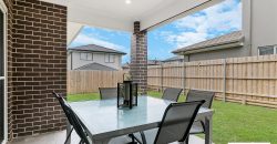 Near New 4 Bedroom Family Home with Easy to Maintain Backyard and Covered Pergola