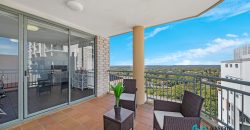 Full Brick Apartment Offering District Views and Natural Light