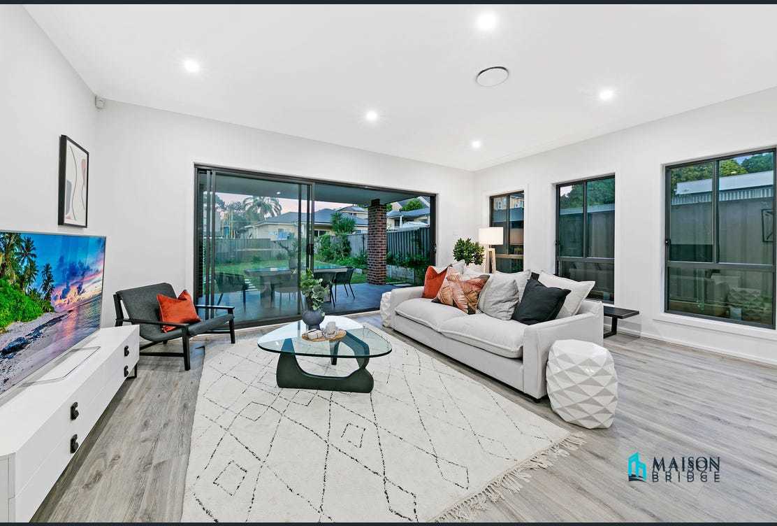 Modern Luxury Duplex Home Nestled In A Quiet Location!