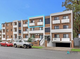 Top Floor Full Brick Unit in Prime Locale