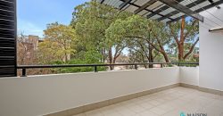 Top Floor Full Brick Unit in Prime Locale