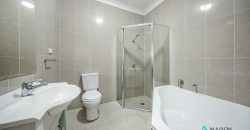 Top Floor Full Brick Unit in Prime Locale