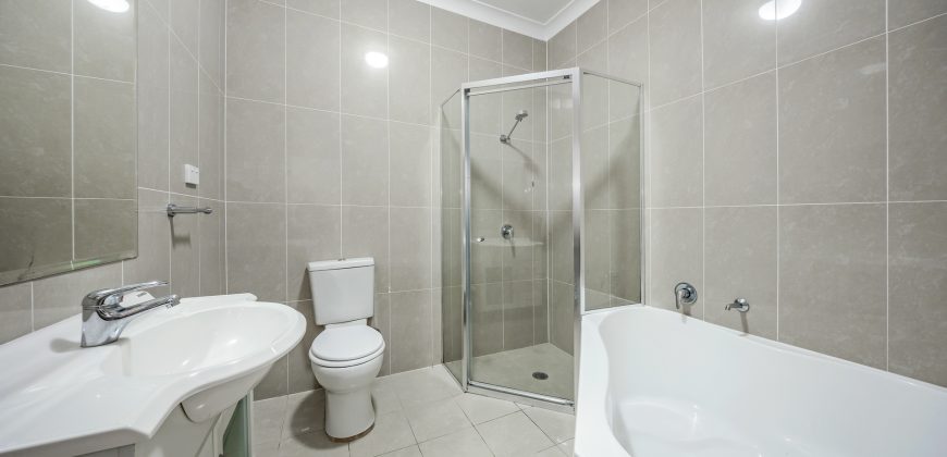 Top Floor Full Brick Unit in Prime Locale