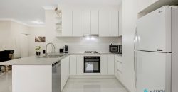 Top Floor Full Brick Unit in Prime Locale