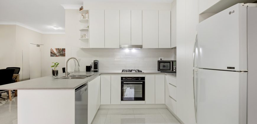 Top Floor Full Brick Unit in Prime Locale