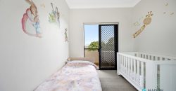Top Floor Full Brick Unit in Prime Locale