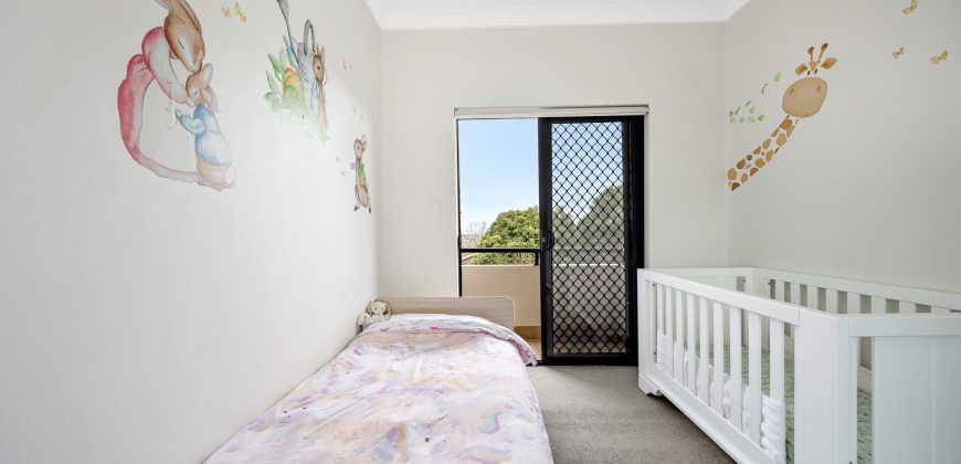 Top Floor Full Brick Unit in Prime Locale