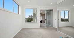 Top-Floor Apartment with Bright Interiors and Scenic District Views Top-Floor Apartment with Bright Interiors and Scenic District Views