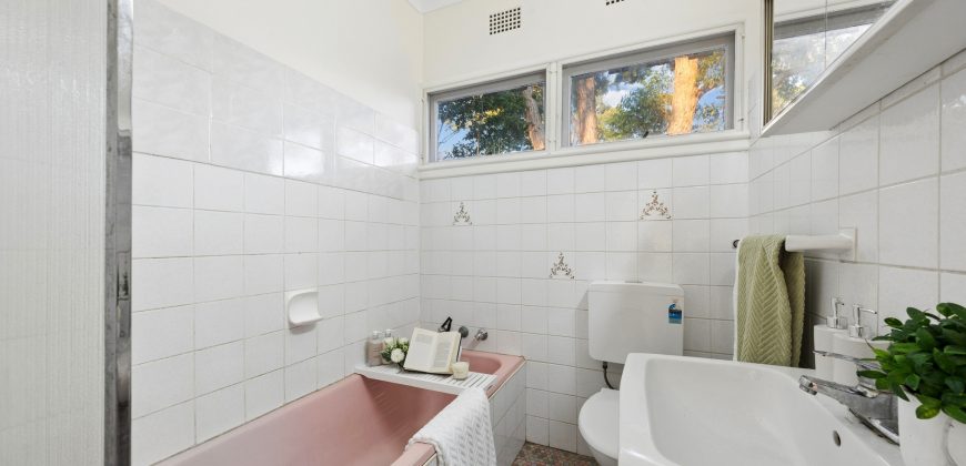 Comfy Corner Block Home with Spacious Deck & Future Potential