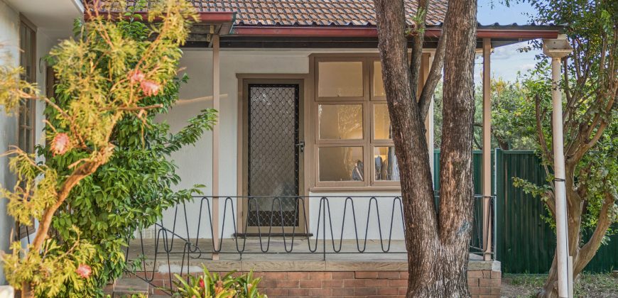 Comfy Corner Block Home with Spacious Deck & Future Potential