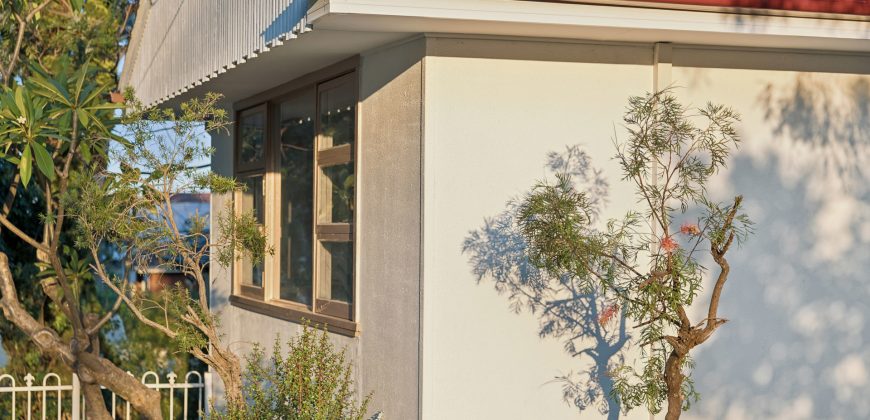 Comfy Corner Block Home with Spacious Deck & Future Potential