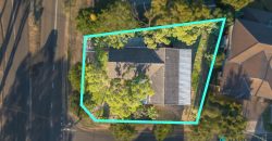 Comfy Corner Block Home with Spacious Deck & Future Potential
