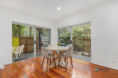 Exceptional Ground Floor Unit with Large Deck, Serene and Private Setting