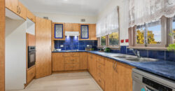 Comfy Corner Block Home with Spacious Deck & Future Potential