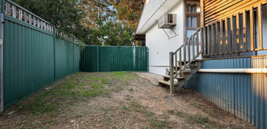 Comfy Corner Block Home with Spacious Deck & Future Potential