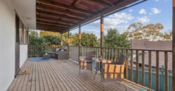 Comfy Corner Block Home with Spacious Deck & Future Potential