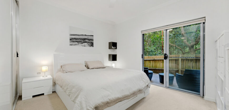 Exceptional Ground Floor Unit with Large Deck, Serene and Private Setting
