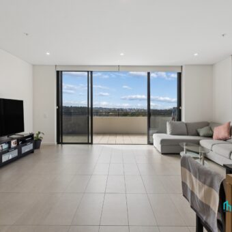 Top-Floor Penthouse with Expansive Entertainer’s Terrace & Sweeping Views