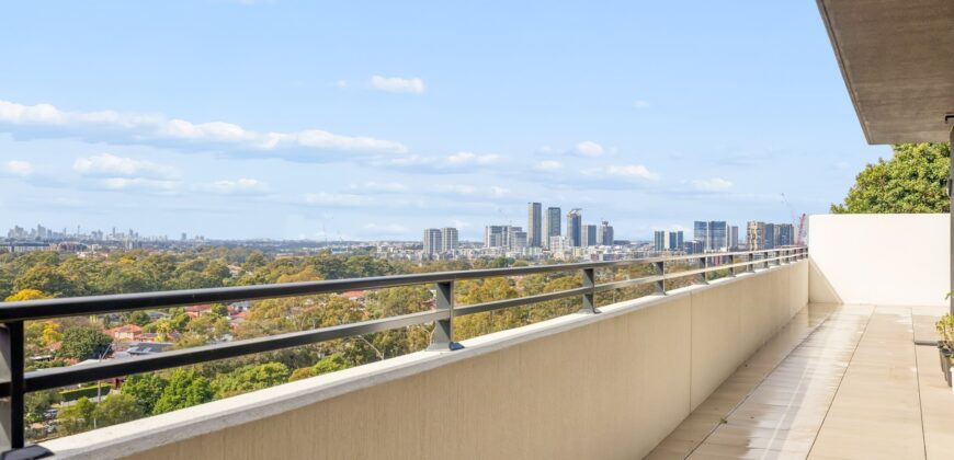 Top-Floor Penthouse with Expansive Entertainer’s Terrace & Sweeping Views