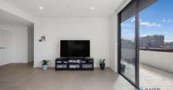 Top-Floor Penthouse with Expansive Entertainer’s Terrace & Sweeping Views