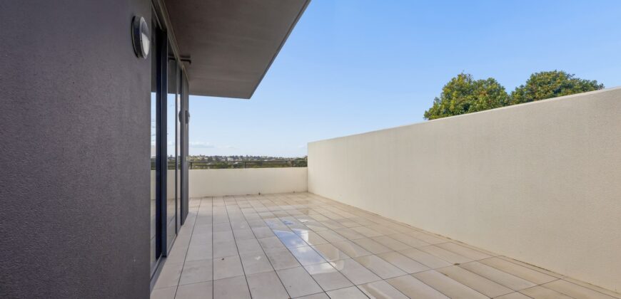 Top-Floor Penthouse with Expansive Entertainer’s Terrace & Sweeping Views