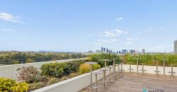 Top-Floor Penthouse with Expansive Entertainer’s Terrace & Sweeping Views