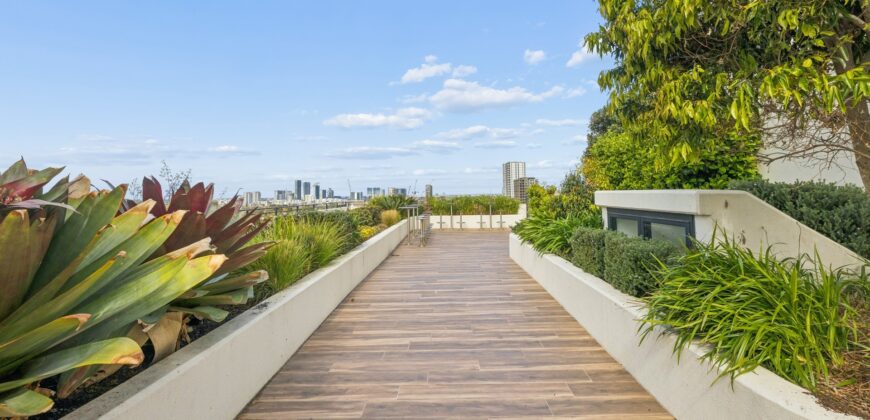 Top-Floor Penthouse with Expansive Entertainer’s Terrace & Sweeping Views